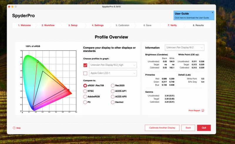 A computer screen displaying the SpyderPro software interface. The software shows a profile overview with a color calibration graph and detailed information about the display. Options to set, verify, and save display settings are available along with a user guide link.