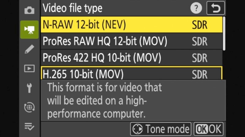 A camera menu interface showing video file type options. Selected is "N-RAW 12-bit (NEV)" with "SDR" highlighted. Other options include "ProRes RAW HQ 12-bit (MOV)", "ProRes 422 HQ 10-bit (MOV)", and "H.265 10-bit (MOV)", all labeled "SDR". A note reads “This format is for video that will be edited on a high-performance computer.” Two buttons at the bottom: "OK" and "Cancel".