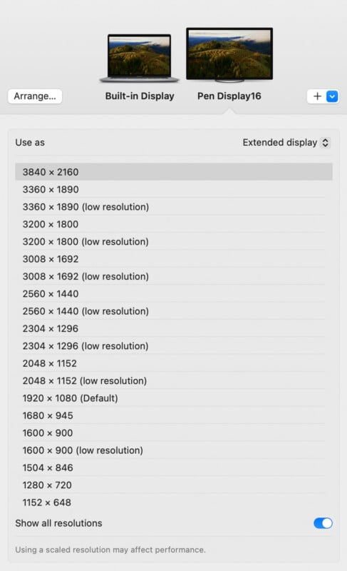 Screenshot of a display settings window showing two displays: a built-in display and a "Pen Display16." Below are various resolution options listed for selection, ranging from 3840 x 2160 to 1152 x 648, with the warning that using a scaled resolution may affect performance.