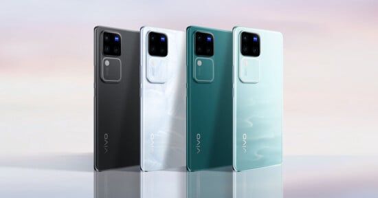 Four Vivo V30 Pro smartphones in different colors, including black, white, dark green, and mint green. The phones are viewed at an angle.